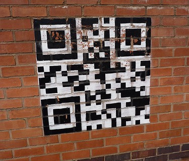 QR Code vs SMS - Brickwall